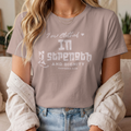 T-Shirt — “I’m Clothed in Strength” Inspirational Women’s Tee
